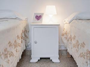 A bed or beds in a room at Casa Convent
