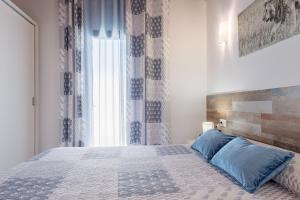 Postel nebo postele na pokoji v ubytování Casa Capricho