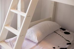 Łóżko lub łóżka w pokoju w obiekcie Apartamento Marei 1