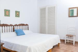 A bed or beds in a room at Cala Serena Beach 6
