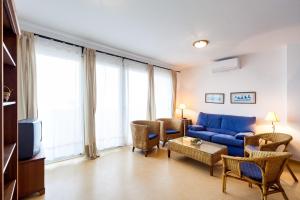 Posezení v ubytování Duplex A Fontanilla