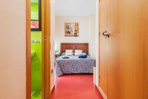 Posteľ alebo postele v izbe v ubytovaní Apartamento con encanto y céntrico