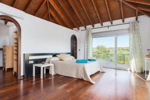 Postel nebo postele na pokoji v ubytování Finca Casa Rural Lumalú + 23 fotografií