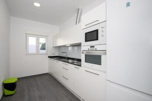 Kuchnia lub aneks kuchenny w obiekcie Apartamento Marei 1