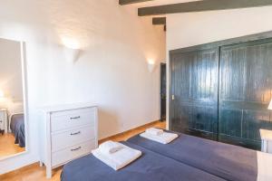 Postel nebo postele na pokoji v ubytování Casa 5 Q en Complejo Binisafua