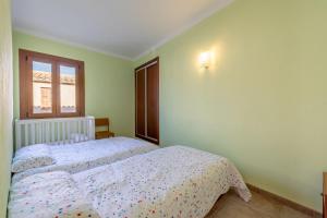 Postel nebo postele na pokoji v ubytování Caril