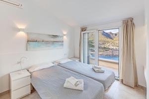 Postel nebo postele na pokoji v ubytování Apartamento Mirador 6i + 17 fotografií