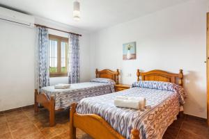 Postel nebo postele na pokoji v ubytování Villa Damian 12 + 19 fotografií