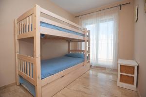 Łóżko lub łóżka w pokoju w obiekcie La Casa de la Dehesa- Sólo Familias