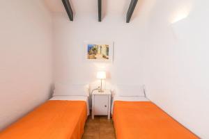 Postel nebo postele na pokoji v ubytování Casa 5 Q en Complejo Binisafua