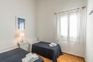 Postel nebo postele na pokoji v ubytování Casa 5 Q en Complejo Binisafua