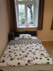 Posteľ alebo postele v izbe v ubytovaní White Rose apartment