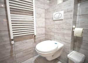 Kúpeľňa v ubytovaní White Rose apartment