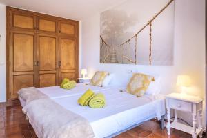 Postel nebo postele na pokoji v ubytování Casa Mamita Ibiza