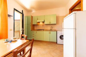 Fotografie z fotogalerie ubytování Appartamenti Cavour cod C v destinaci Villasimius