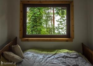 Posteľ alebo postele v izbe v ubytovaní Nad Jeziorem Zelwa - Puszcza Augustowska + 15 fotografií