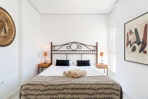 Posteľ alebo postele v izbe v ubytovaní Villa Con Encanto Cerca De La Playa + 26 fotografií