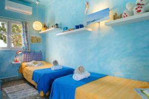 Posteľ alebo postele v izbe v ubytovaní Villa Atalaya