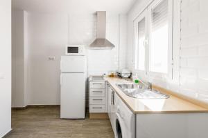 Kuchyň nebo kuchyňský kout v ubytování Apartamento La Higuera 2 + 13 fotografií