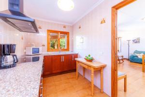 Kuchyň nebo kuchyňský kout v ubytování Villa Jacoba