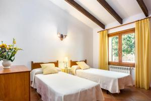 Postel nebo postele na pokoji v ubytování Villa Tabo + 19 fotografií