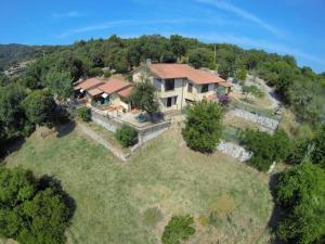 an aerial view of a house on a hill at Appartamenti Le Querce - Lentisco in Capoliveri