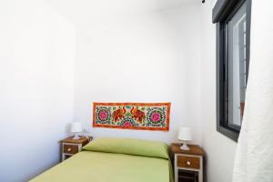 Posteľ alebo postele v izbe v ubytovaní Villa Los Olivares