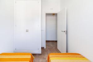 Posteľ alebo postele v izbe v ubytovaní Villa Los Olivares