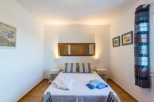 Postel nebo postele na pokoji v ubytování White Sands 3.07