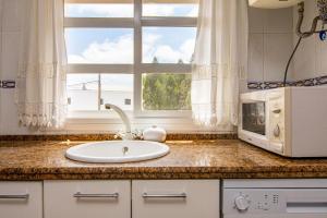 Kuchyňa alebo kuchynka v ubytovaní Apartamento en Vejer