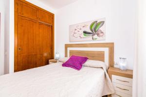 Posteľ alebo postele v izbe v ubytovaní Apartamento en Vejer