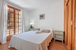 Posteľ alebo postele v izbe v ubytovaní Villa Creus