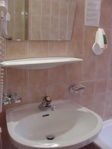 Kúpeľňa v ubytovaní Hotel Garni Schieferle