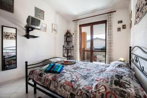 Posteľ alebo postele v izbe v ubytovaní Villa Rita
