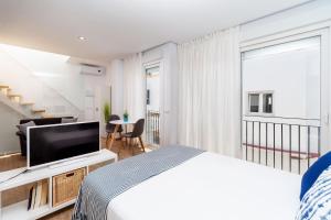 TV a/nebo společenská místnost v ubytování Apartamento Sol