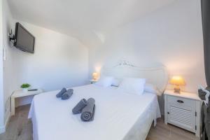Ein Bett oder Betten in einem Zimmer der Unterkunft Can Botana 1