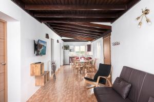 a living room with a couch and a table at Villa Ralue in Tuineje