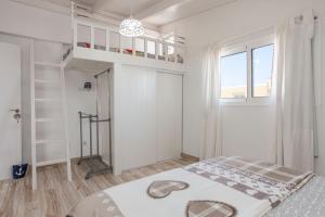 Posteľ alebo postele v izbe v ubytovaní Atico Casapueblo