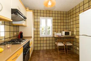 Imagen de la galería de Apartamento cerca de Cala Mitjana, en Cala Galdana 17 fotos más