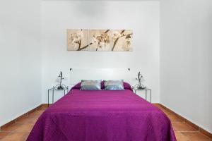 Posteľ alebo postele v izbe v ubytovaní Casa Marquez - Sólo Familias + 21 fotografií