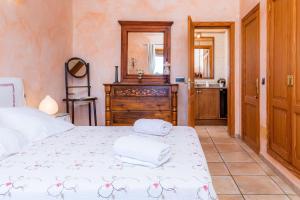 Ein Bett oder Betten in einem Zimmer der Unterkunft Los tres soles