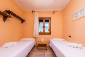 Ein Bett oder Betten in einem Zimmer der Unterkunft Los tres soles