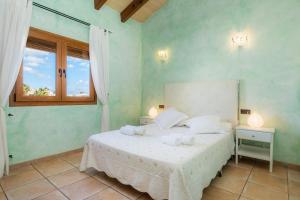 Ein Bett oder Betten in einem Zimmer der Unterkunft Los tres soles