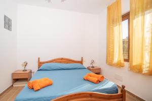 A bed or beds in a room at Casa Albina