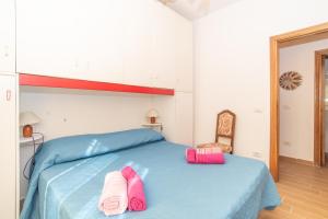 A bed or beds in a room at Casa Albina