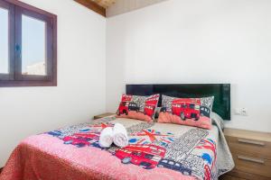 Posteľ alebo postele v izbe v ubytovaní Casa Hefestión