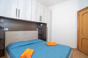 A bed or beds in a room at Casa Albina