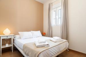 Postel nebo postele na pokoji v ubytování Vivienda turística Los Naranjos 2