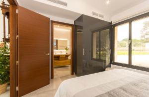 Ein Bett oder Betten in einem Zimmer der Unterkunft Villa Ca Na Marga
