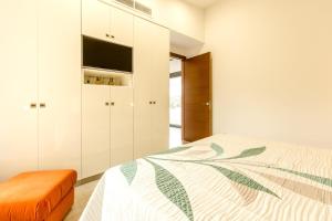 Ein Bett oder Betten in einem Zimmer der Unterkunft Villa Ca Na Marga